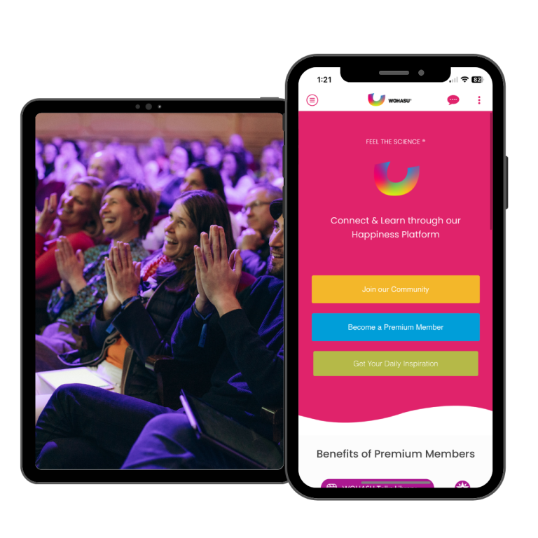 WOHASU app screen and World Happiness Summit audience clapping in the background